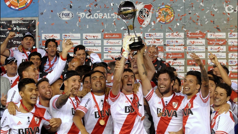 River Plate goalkeeper Marcelo Barovero and forward Fernando Cavenaghi hold the Copa Sudamericana aloft in Buenos Aires