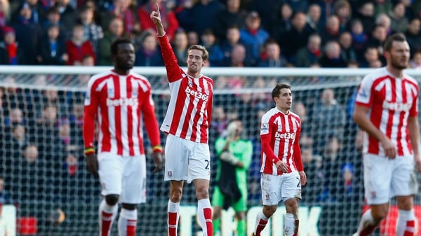 Peter Crouch celebrates scoring the equaliser