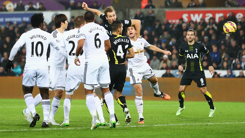Harry Kane heads Spurs into an early lead at Swansea