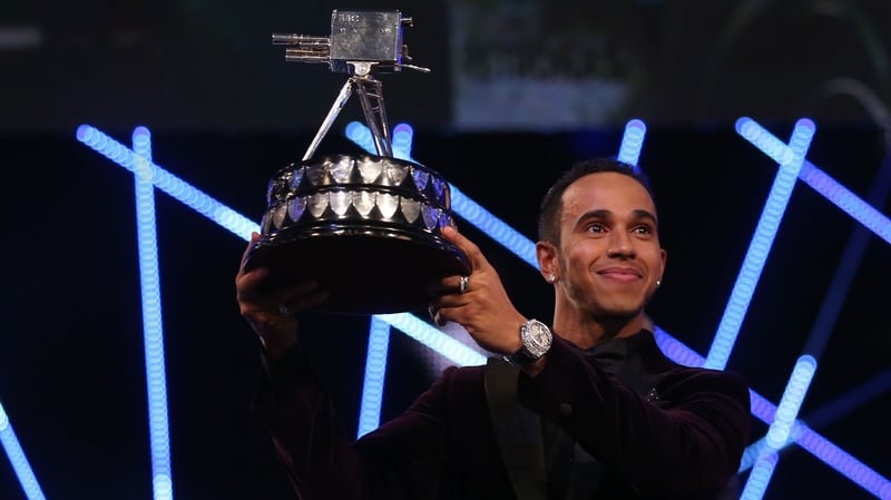 Lewis Hamilton with his BBC Sports Personality of the Year trophy