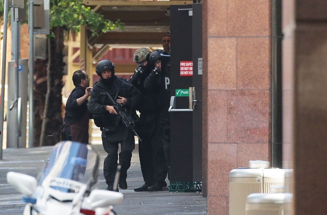 Police officers with an escaped hostage