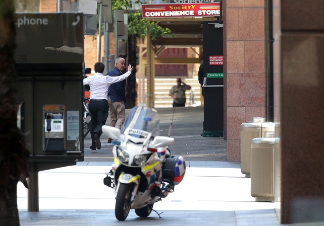 Two hostages run to safety