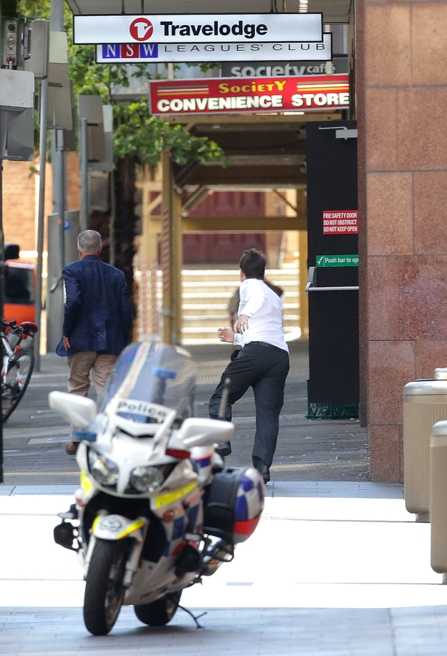 Hostages running to safety