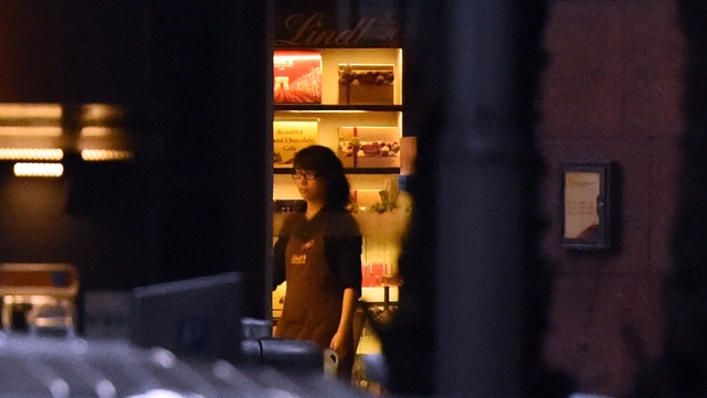 A staff member inside the café