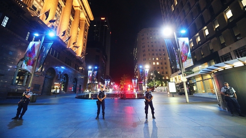 Police officer in the CBD after the siege