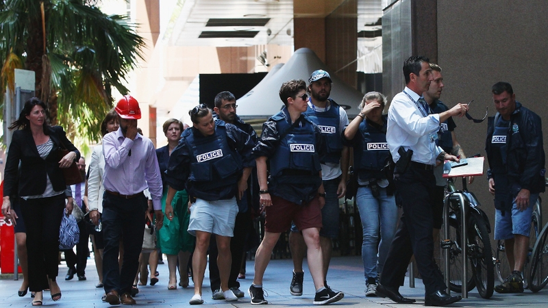 People are evacuated from the CBD as the hostage situation unfolds
