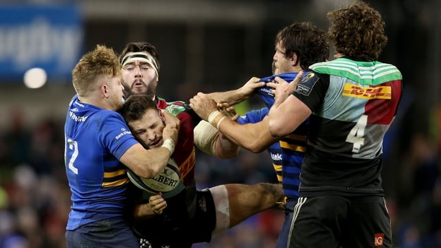 Getting shirty: Leinster's Ian Madigan and Mike McCarthy grapple with Danny Care and Charlie Matthews of Harlequins during Leinster's 14-13 win in their Champions Cup clash