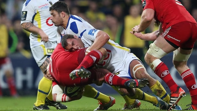 Up and under:
Munster’s BJ Botha goes airborne as he's tackled by Clermont Auvergne’s Damien Chouly and Alexandre Lapandry