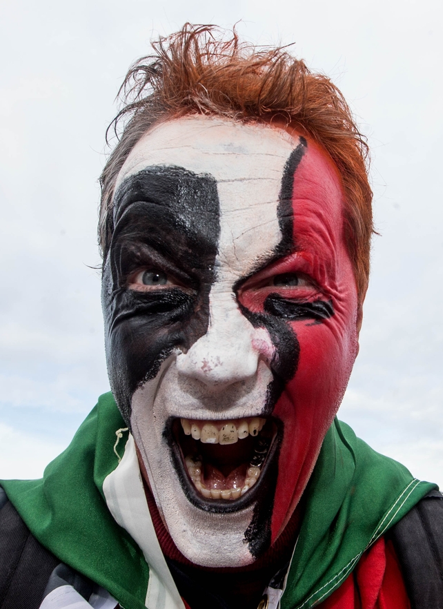 The Scream: Munster fan Patrick Doyle shows his colours before the Reds' game at Clermont