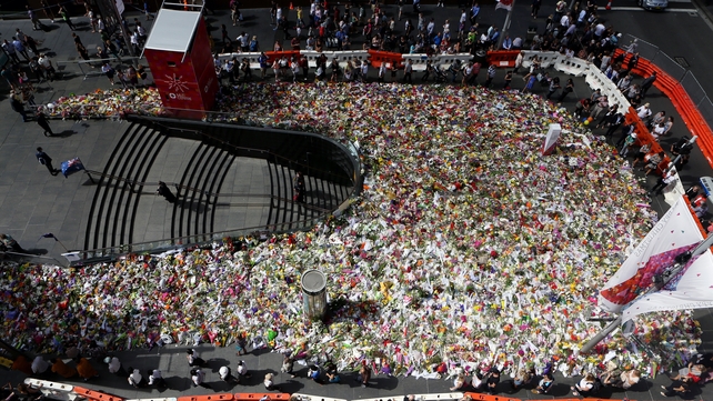 Flowers left in Sydney as a tribute to the victims of a fatal café siege
