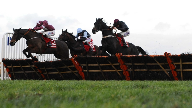 Davy Condon riding Bayan (L) clear the last to win the Ladbroke at Ascot