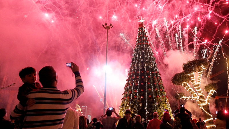 Fireworks explode over a giant Christmas tree during the 'Beirut Christmas carnival'