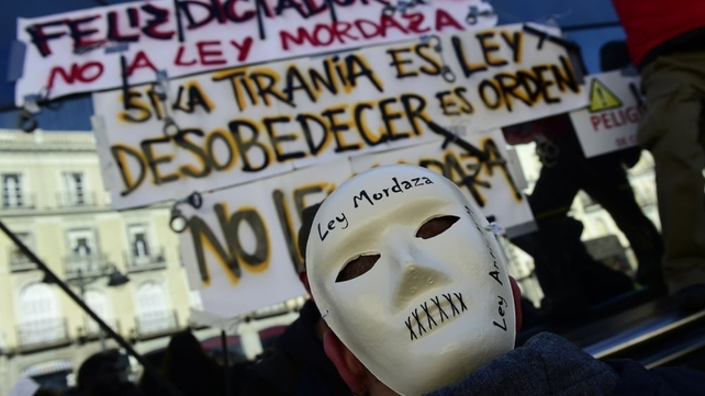Demonstrators against the new public security law approved by the lower house of parliament in Spain