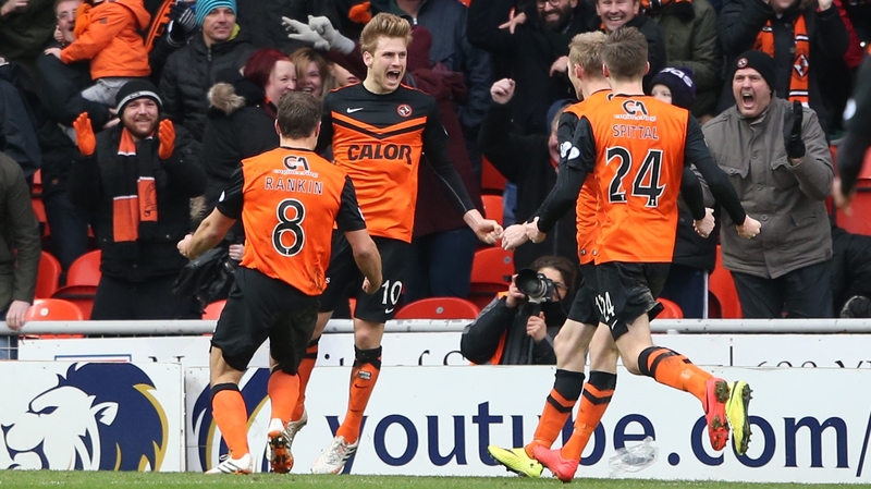 Dundee Utd's Stuart Armstrong (2nd L) celebrates scoring at Tannadice Park