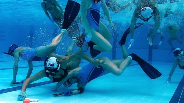 Megan Pardoe of Western Australia and Amy Barry-Macaulay of Victoria in action during the 2014 Australian Underwater Hockey Championships