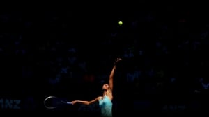 Maria Sharapova of Russia serves in her second round match against Karin Knapp of Italy during the 2014 Australian Open