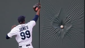 James Jones of Seattle fails to reach a fly ball against LA in Anaheim