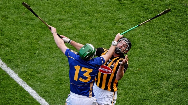 Tipperary's Noel McGrath and Kilkenny's Jackie Tyrell battle for possession in the drawn final