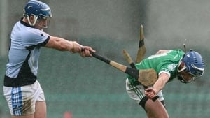 Na Piarsaigh's Michael Casey breaks Gavin O'Mahony hurley during the Limerick SHC final against Kilmallock