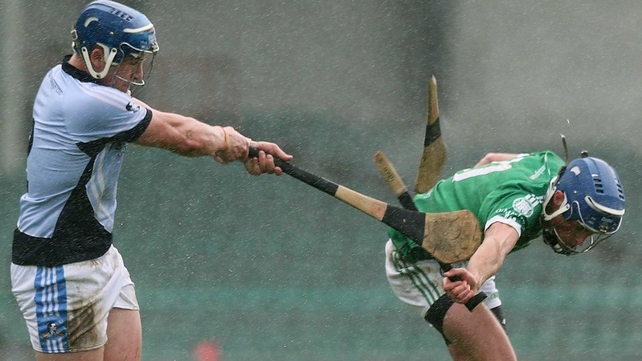 Na Piarsaigh's Michael Casey breaks Gavin O'Mahony hurley during the Limerick SHC final against Kilmallock