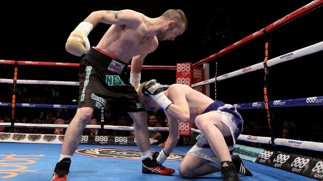 John Joe Nevin knocks down Jack Heath during their featherweight clash