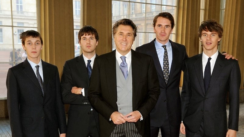 Bryan Ferry with his four sons (L-R) Merlin, Isaac, Otis, and Tara at Bryan's Investiture Ceremony at Buckingham Palace in 2011