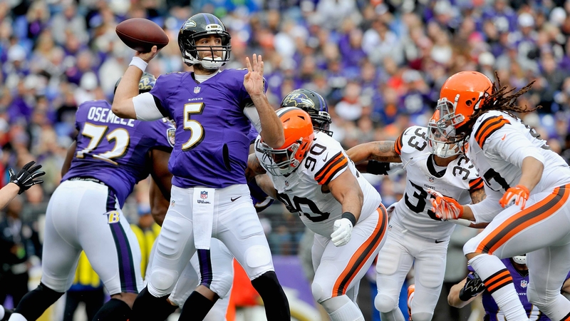 Quarterback Joe Flacco of the Baltimore Ravens drops back to pass in the first quarter of the game against the Cleveland Browns