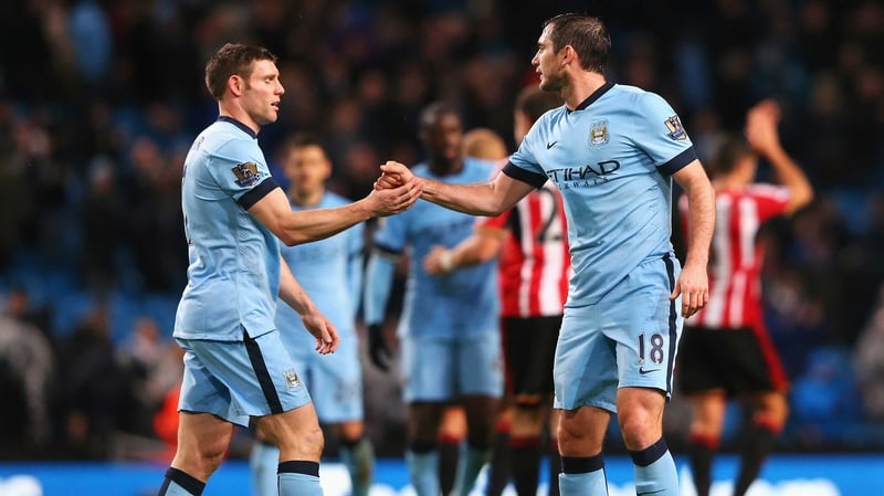 Frank Lampard celebrates with James Milner after the win over Sunderland