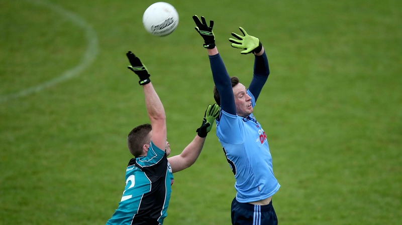 Harry Dawson of Dublin with Conor McGrath of Maynooth in Parnell Park