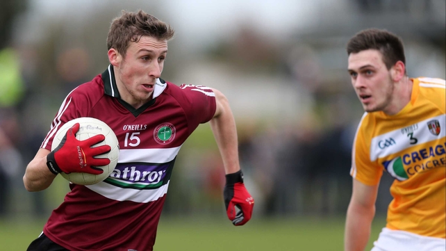 Barry O'Hagan of St Mary's takes on Antrim's Conor Burke in the McKenna Cup