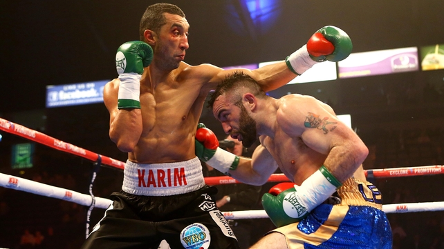 Stephen Ormond (R) in action against Karim El Ouazghari during the third defence of his WBO European lightweight title at the Odyssey Arena, Belfast
