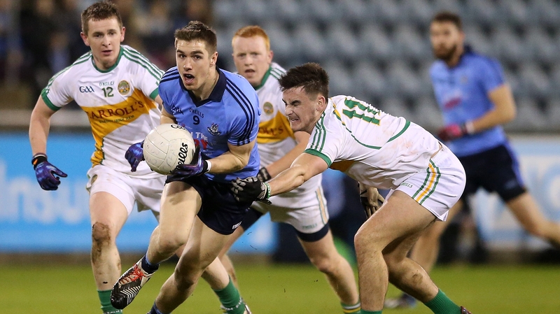 Dublin's Emmett O'Conghaile gets away from Eoin Carroll of Offaly