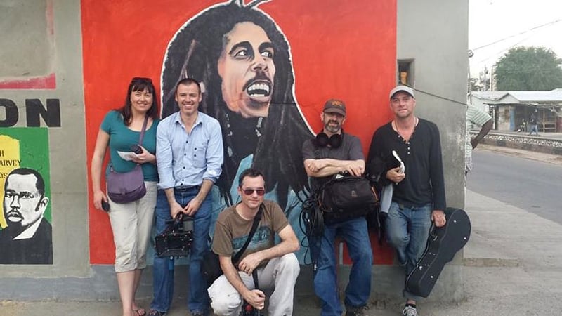 Paddy Hayes (centre) and the Ceolchuairt team in Jamaica