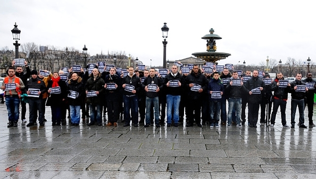 The friendly association of French police observe a minute's silence at "Place de la Concorde" in France
