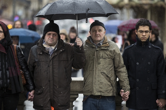 People gather on Place de la Republique in France to observe a minute's silence