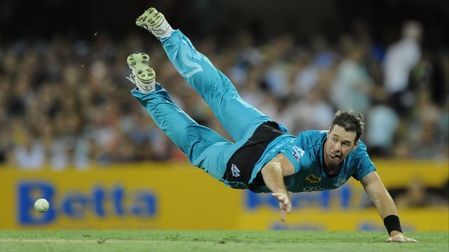 Daniel Christian of the Heat fields during the Big Bash league match against the Adelaide Strikers at The Gabba in Brisbane