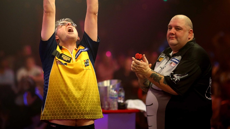 The unheralded Jeff Smith of Canada celebrates his shock quarter-final win against England's Robbie Green