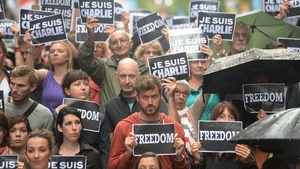 Members of Sydney's French community gather in the heart of the city to pay tribute to the Paris jihadist attack victims, just metres from the scene of a deadly cafe siege last month in the city