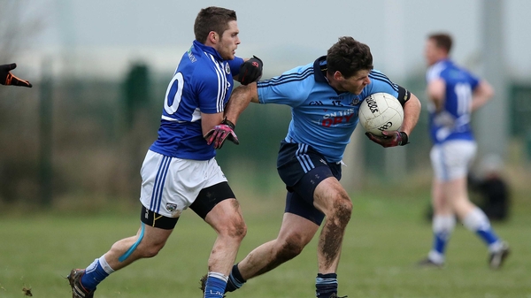 Dublin’s Kevin McManamon tries to break free from the attention of Laois's Robbie Kehoe