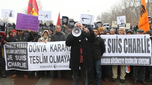 Demonstrators take part in a protest outside the Kizilay Square in Ankara, Turkey