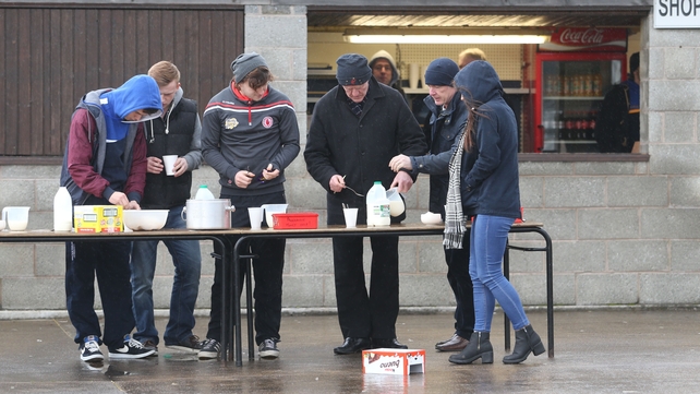 Spectators have a cup of tea before the Fermanagh vs Derry McKenna Cup clash