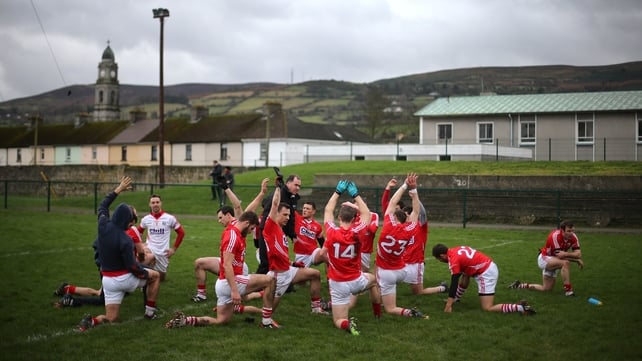 Cork players warm down after their victory over the Premier County