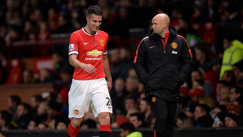 Robin van Persie grimaces as he exits the fray during Manchester United’s loss to Southampton