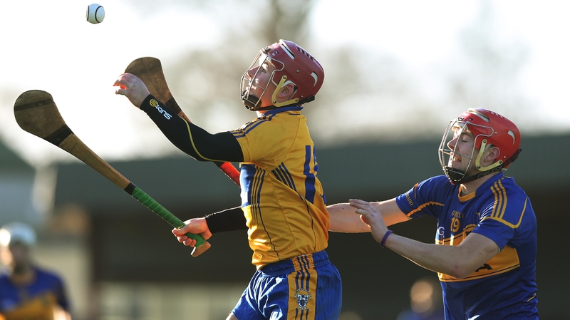 Clare's David O'Halloran beats Stephen Maher to the sliotar at O'Garney Park
