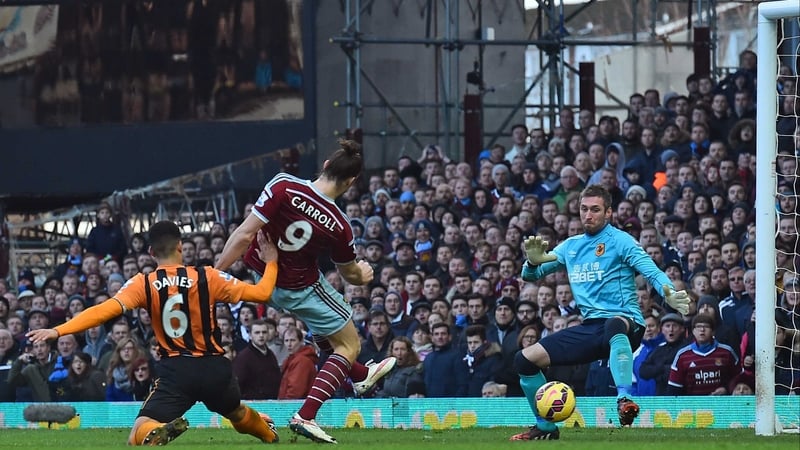 Andy Carroll slots home his fifth Premier League goal of the season from close range