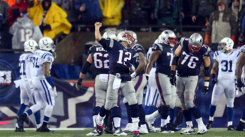 Tom Brady (#12) celebrates a touchdown