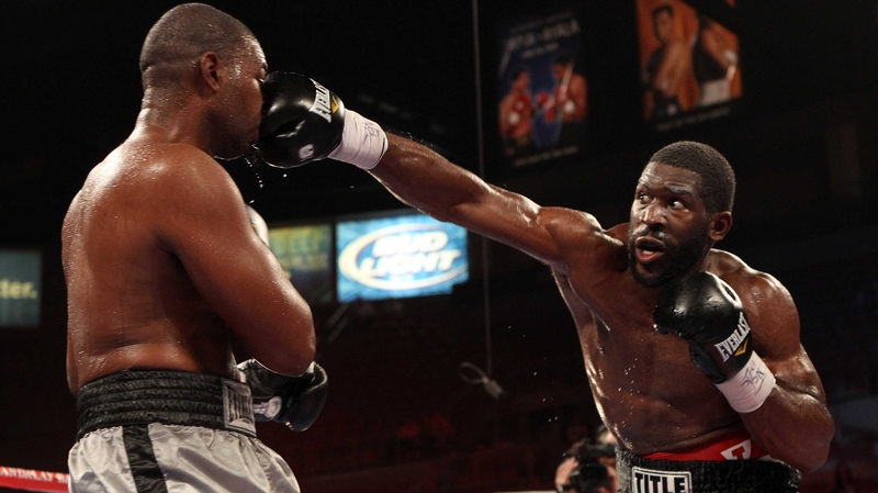 Bryant Jennings (R) connects with a right to the face of Theron Johnson