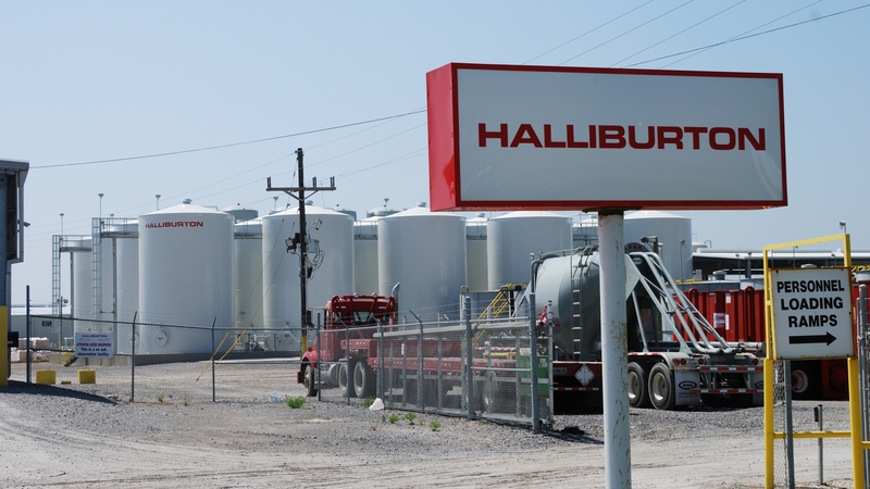 Firms warn that a fall in drilling activity due to weak oil prices would hurt results in 2015