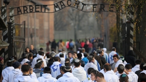 Young Israelis draped in their national flag as they visited the camp in November 2014