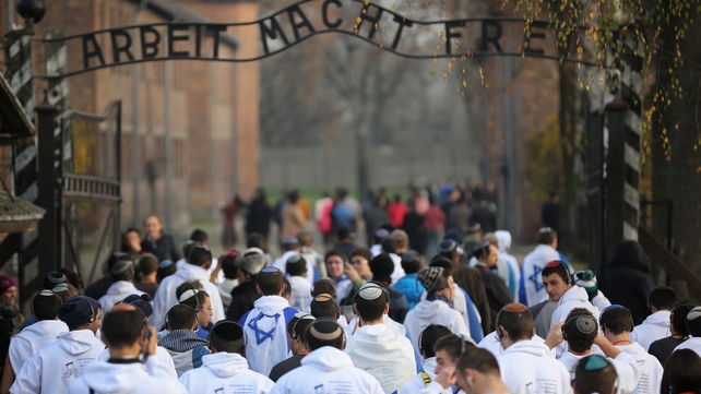 Young Israelis draped in their national flag as they visited the camp in November 2014